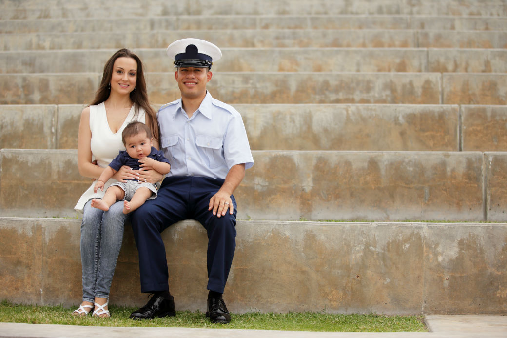 Military Family Sitting Near Monument - Copyright - Felix Mizioznikov