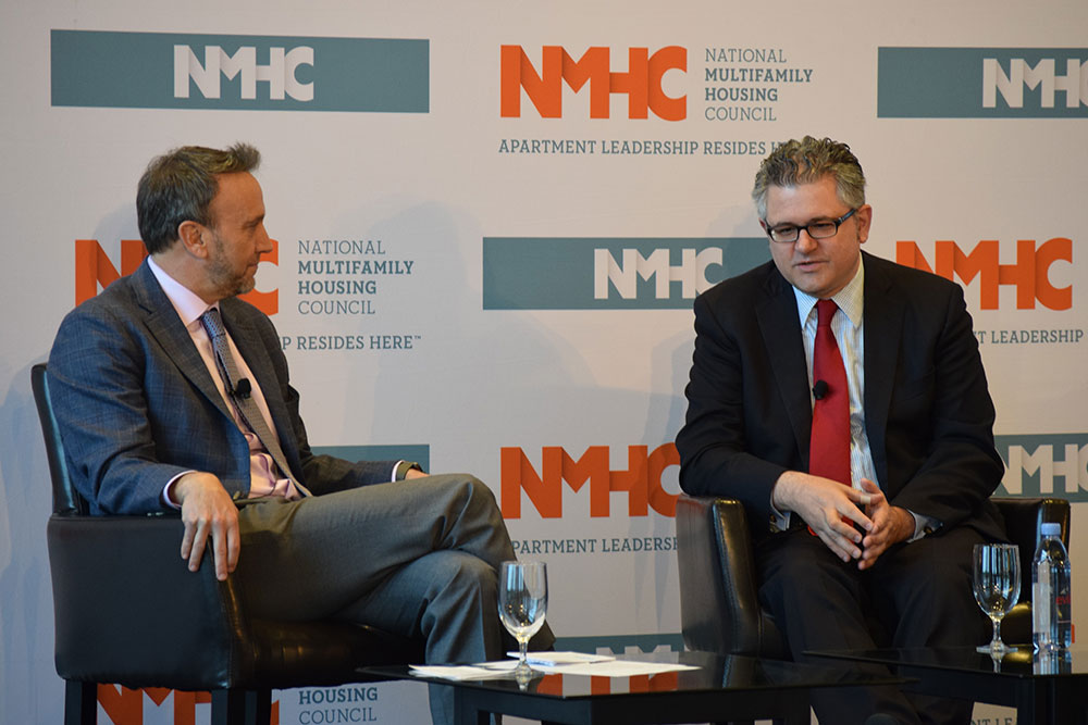 FHFA Director Mark Calabria shares his announcement with NMHC Vice Chair David Schwartz at the 2019 NMHC Fall Meeting.