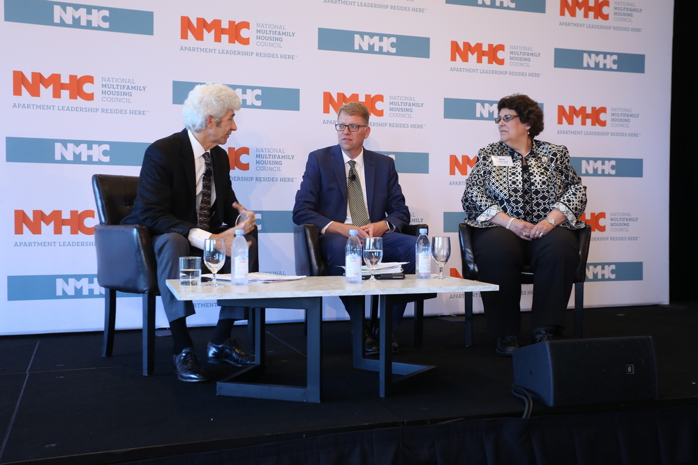 NMHC’s Mark Obrinsky (left) discusses the future economic outlook with Freddie Mac’s Steve Guggenmos (center) and Fannie Mae’s Kim Betancourt (right).