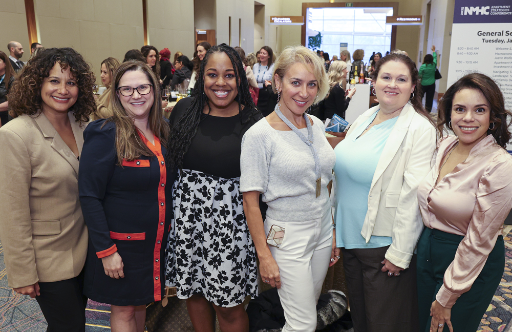 Membership Development & Community Engagement Sponsorship Women smiling posing as a group together while at reception